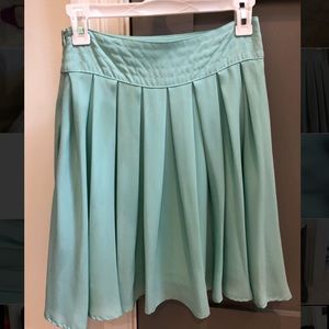 Francesca’s teal pleaded everyday skirt sz medium